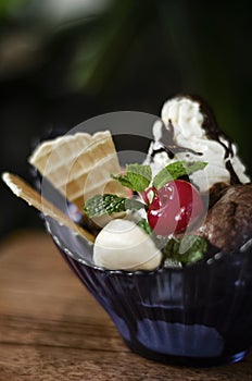 Gourmet organic chocolate and strawberry ice cream sundae dessert