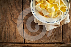 Gourmet presentation of butter curls at table