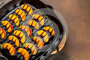 Gourmet Roasted Peaches in pan. banner, menu, recipe place for text, top view
