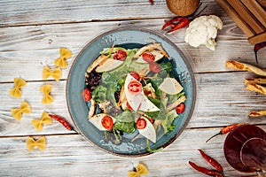 Gourmet salad with turkey apple greens vegetables