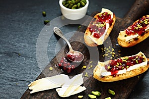 Gourmet sandwiches with camembert and cranberries