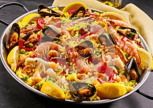Gourmet seafood paella with prawns and mussels