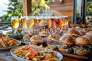 Gourmet slider burgers and fries with beer sampler on patio table