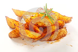 Gourmet Spicy Fried Potato Wedges on Plate