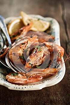 Gourmet spicy grilled whole prawns photo