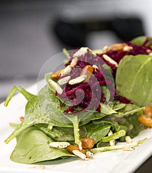 Gourmet spinach salad with red beats