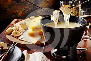 Gourmet Swiss fondue dinner on a winter evening