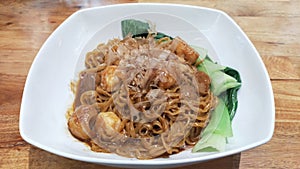 Gourmet Truffle Oil Seafood Fried Noodles on Elegant White Plate
