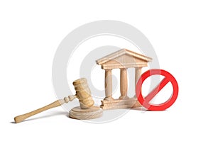 Government or bank building and a red NO symbol with a judge gavel. Cancellation of law or decree. Declaration of default