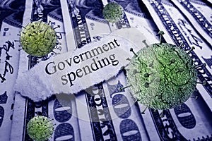 Government Spending news headline with Coronavirus on money