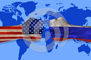 Governments conflict concept. Male fists colored in USA and Russian flags on world map background. Conflict between USA and Russia