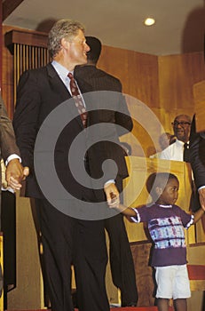 Governor Bill Clinton attends service at the Olivet Baptist Church in Cleveland, Ohio during the Clinton/Gore 1992 Buscapade Great