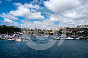 Gozo, Malta. The second island in size in Malta. Harbour view with the old cit and Cathedral in the back