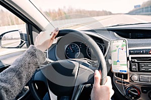 Gps car map system. Global positioning system on smartphone screen in auto car on travel road. Navigation auto location