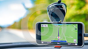 GPS car navigation along a beautiful countryside road