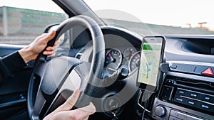 Gps navigation map system. Global positioning system on smartphone screen in auto car on travel road. GPS device