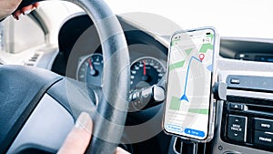 Gps navigation map system. Global positioning system on smartphone screen in auto car on travel road. GPS device