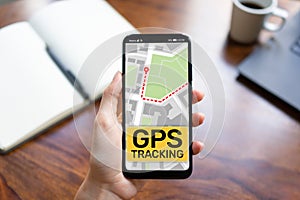 GPS tracking map on smartphone screen.  Global positioning system, navigation concept.