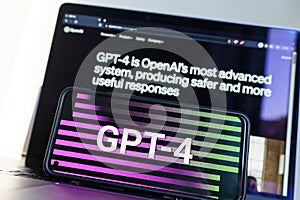 GPT - 4 on screens. OpenAI released new version of GPT 4. ChatGPT AI chatbot