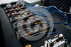 Gpu cards preparing to mine cryptocurrency, devices on mining rig. bitcoin. photo