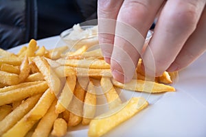 Grabbing some French fries