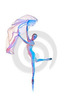 Graceful, beautiful young woman, ballet dancer standing on pointe, dancing with transparent fabric isolated on white