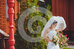 Graceful bride in luxurious wedding dress