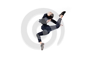 Businesswoman in formal wear jumping in dance isolated on white