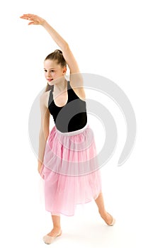 Graceful Girl Gymnast Performing Rhythmic Gymnastics Exercise