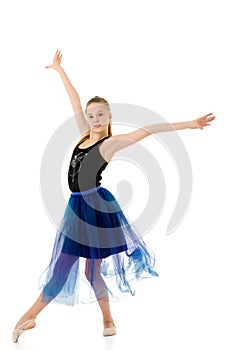 Graceful Girl Gymnast Performing Rhythmic Gymnastics Exercise.