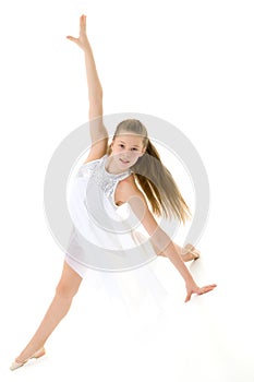 Graceful Girl Gymnast Performing Rhythmic Gymnastics Exercise.