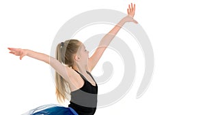 Graceful Girl Gymnast Performing Rhythmic Gymnastics Exercise.