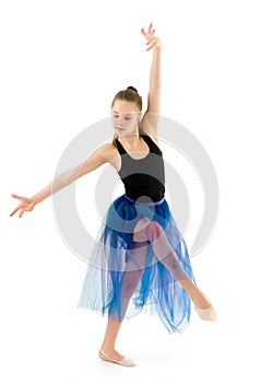 Graceful Girl Gymnast Performing Rhythmic Gymnastics Exercise.