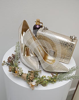 graceful shoes of the bride, studded with shiny pebbles