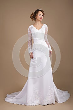 Graceful Young Bride in Wedding Dress photo