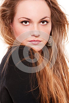 Graceful young woman with long hair