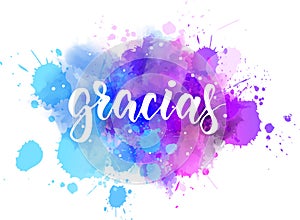 Gracias lettering on watercolor background photo