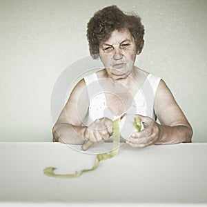 Gracious senior lady portrait with apple