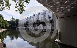 Grade II listed Grand Union Walk housing by Nicholas Grimshaw and Regent`s Canal in Camden Town.