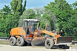 Grader on bridge road construction