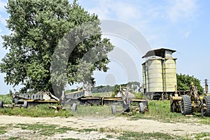 Grader on a trailer for heavy equipment.