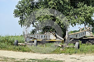 Grader on a trailer for heavy equipment.