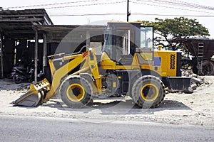Grader and yellow bulldozer excavator Construction Equipment with clipping on street.