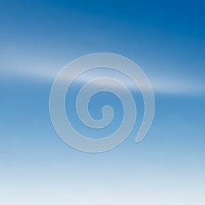 A gradient blue sky, transitioning from a deep blue at the top to a lighter blue at the bottom. A