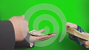 Gradual Cash Transfer: Woman Handing Money to Man on Chroma Key