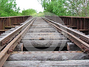 Gradually, corrosion consumes the abandoned railroad photo
