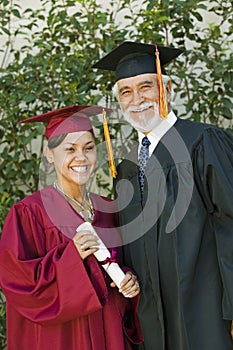 Graduate and dean outside photo