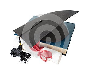 Graduate hat, book and scroll