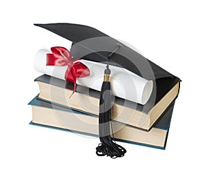 Graduate hat, books and scroll