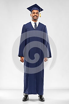 Graduate student in mortar board and bachelor gown